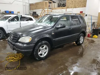 1999 Mercedes-Benz M-Class with VIN 4JGAB54E3XA101177, listed as a Copart auction lot 78703184 with 236,957 mi miles and Salvage Title. Bid and sale history available at carsss.com. Image 1.