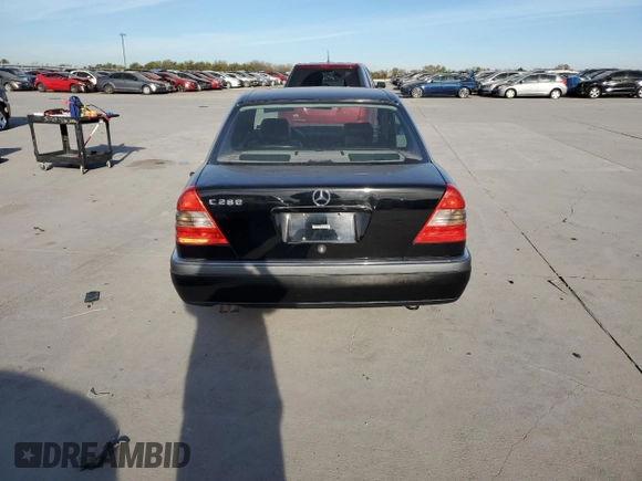1994 Mercedes-Benz C with VIN WDBHA28E5RF090458, listed as a Copart auction lot 82380184 with Not Provided miles and Salvage Title. Bid and sale history available at carsss.com. Image 6.
