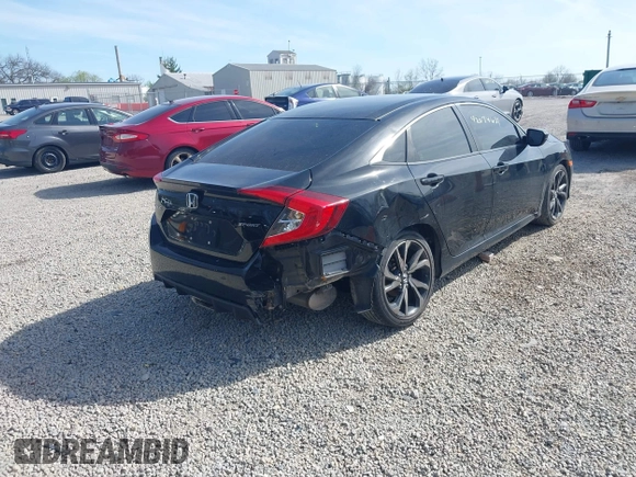 2019 Honda Civic Sport with VIN 19XFC2F86KE045495, listed as a IAAI auction lot 42074631 with 52,864 mi miles and . Bid and sale history available at DreamBid. Image 4.