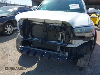 2023 Toyota Tacoma SR z VIN 3TYCZ5AN5PT151681, wystawiony jako IAAI lot #41936577 z przebiegiem 30 056 mil mil oraz . Historia ofert i sprzedaży dostępna na DreamBid. Obrazek 6.