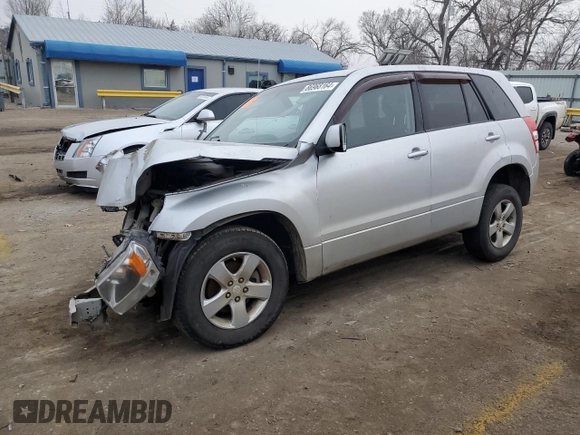 2012 Suzuki Grand Vitara Premium z VIN JS3TD0D66C4100621, wystawiony jako Copart lot #86968164 z przebiegiem Nie podano mil oraz Szkody całkowita. Historia ofert i sprzedaży dostępna na DreamBid. Obrazek 1.
