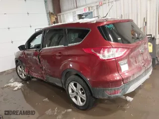 2014 Ford Escape SE with VIN 1FMCU9GX7EUA33937, listed as a IAAI auction lot 41504576 with 104,908 mi miles. Bid and sale history available at carsss.com. Image 3.