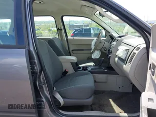 2009 Ford Escape XLS z VIN 1FMCU02709KC11692, wystawiony jako IAAI lot #42202890 z przebiegiem 155 243 mil mil oraz . Historia ofert i sprzedaży dostępna na DreamBid. Obrazek 5.