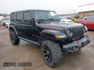 2021 Jeep Wrangler Unlimited Rubicon with VIN 1C4HJXFG2MW628559, listed as a IAAI auction lot 41193146 with 56,474 mi miles. Bid and sale history available at carsss.com. Image 1.