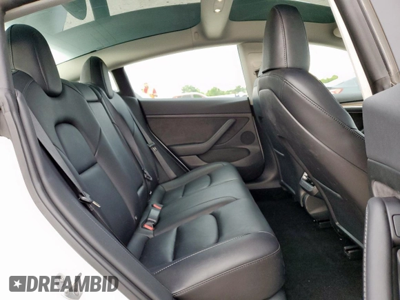 2023 Tesla Model 3 z VIN 5YJ3E1EA3PF488040, wystawiony jako Copart lot #52628165 z przebiegiem 22 326 mil mil oraz Czysty tytuł • Clean title. Historia ofert i sprzedaży dostępna na DreamBid. Obrazek 10.