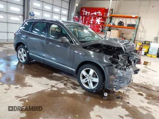 2012 Volkswagen Touareg Sport with VIN WVGFK9BP8CD005510, listed as a IAAI auction lot 41304150 with 162,500 mi miles and . Bid and sale history available at DreamBid. Image 1.