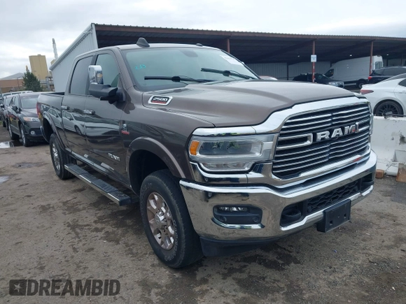 2020 Ram 2500 Laramie z VIN 3C6UR5FL5LG249102, wystawiony jako IAAI lot #41414195 z przebiegiem 42 044 mil mil oraz . Historia ofert i sprzedaży dostępna na DreamBid. Obrazek 1.