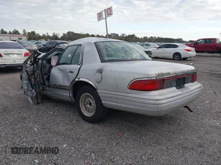 1997 Mercury Grand Marquis LS with VIN 2MELM75W2VX734069, listed as a IAAI auction lot 41405834 with Not Provided miles and . Bid and sale history available at DreamBid. Image 3.