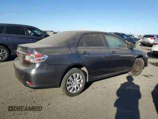 2013 Toyota Corolla L with VIN 2T1BU4EE5DC111728, listed as a Copart auction lot 77217394 with Not Provided miles and Salvage Title. Bid and sale history available at DreamBid. Image 3.