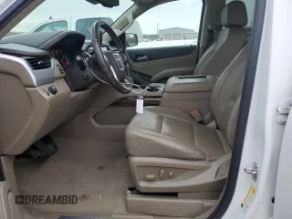 2020 GMC Yukon SLT with VIN 1GKS1BKC3LR168874, listed as a Copart auction lot 82103464 with 79,220 mi miles and Salvage Title. Bid and sale history available at DreamBid. Image 7.