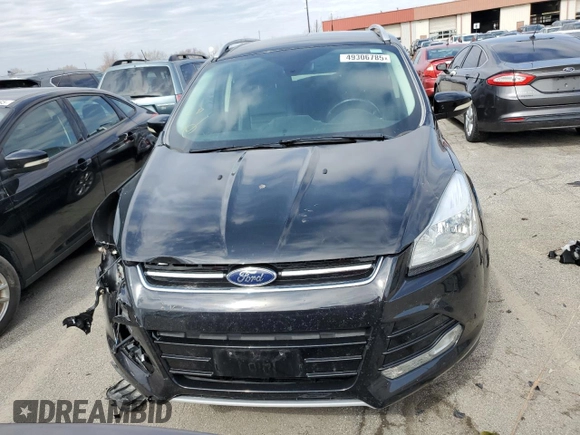 2016 Ford Escape Titanium with VIN 1FMCU0JX1GUA65239, listed as a Copart auction lot 49306785 with 124,658 mi miles and Salvage Title. Bid and sale history available at carsss.com. Image 5.
