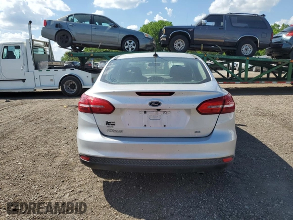 2017 Ford Focus SE z VIN 1FADP3F24HL308294, wystawiony jako Copart lot #56516265 z przebiegiem 80 431 mil mil oraz Szkoda całkowita • Salvage title. Historia ofert i sprzedaży dostępna na DreamBid. Obrazek 6.