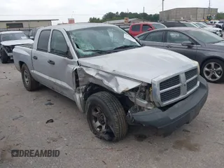 2005 Dodge Dakota ST with VIN 1D7HE28K75S308645, listed as a IAAI auction lot 41931890 with 338,615 mi miles and . Bid and sale history available at carsss.com. Image 1.