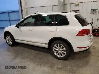 2012 Volkswagen Touareg Exec with VIN WVGEF9BP4CD011823, listed as a Copart auction lot 84063034 with 110,694 mi miles and Non Repairable. Bid and sale history available at DreamBid. Image 2.