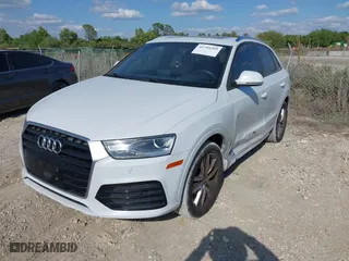 2018 Audi Q3 Premium with VIN WA1BCCFS6JR010047, listed as a IAAI auction lot 41795209 with 99,609 mi miles. Bid and sale history available at carsss.com. Image 2.