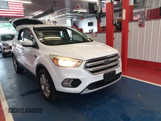2017 Ford Escape SE z VIN 1FMCU0GD2HUD67783, wystawiony jako IAAI lot #42575794 z przebiegiem 98 188 mil mil oraz . Historia ofert i sprzedaży dostępna na DreamBid. Obrazek 2.