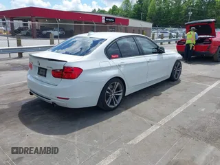 2014 BMW 3 Series 335i z VIN WBA3A9G52ENS64702, wystawiony jako IAAI lot #42273812 z przebiegiem 83 517 mil mil oraz . Historia ofert i sprzedaży dostępna na DreamBid. Obrazek 4.
