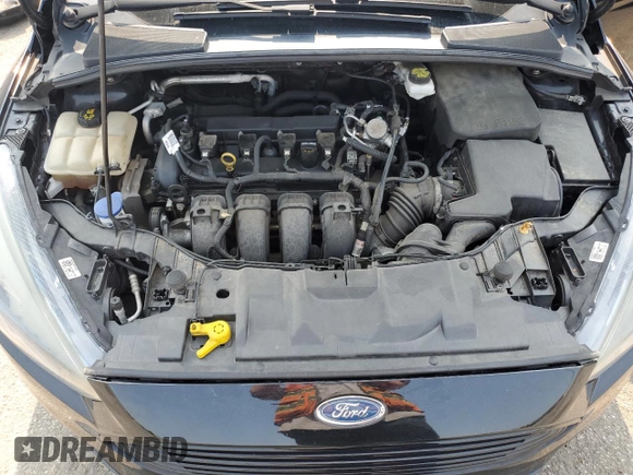 2018 Ford Focus SE z VIN 1FADP3F2XJL228407, wystawiony jako Copart lot #59254415 z przebiegiem 75 241 mil mil oraz Szkoda całkowita • Salvage title. Historia ofert i sprzedaży dostępna na DreamBid. Obrazek 11.