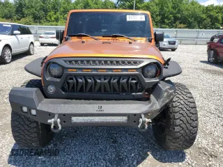 2011 Jeep Wrangler Unlimited Rubicon with VIN 1J4HA6H12BL584493, listed as a Copart auction lot 61765735 with 151,175 mi miles and Salvage title. Bid and sale history available at DreamBid. Image 5.