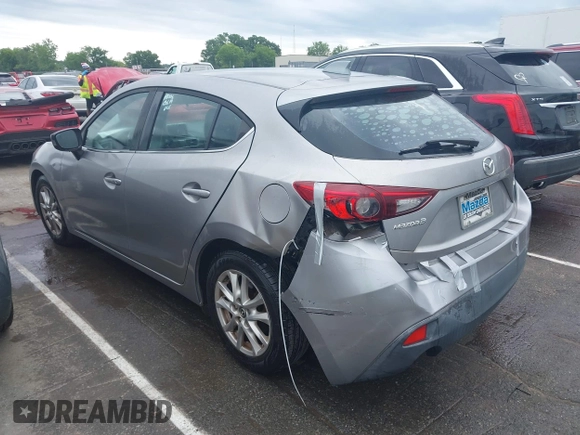 2014 Mazda 3 i Grand Touring z VIN 3MZBM1M73EM110150, wystawiony jako IAAI lot #42260717 z przebiegiem 104 240 mil mil oraz . Historia ofert i sprzedaży dostępna na DreamBid. Obrazek 3.