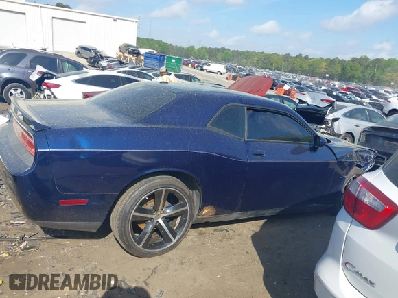 2013 Dodge Challenger SXT z VIN 2C3CDYAG2DH587643, wystawiony jako IAAI lot #41964792 z przebiegiem 179 791 mil mil oraz . Historia ofert i sprzedaży dostępna na DreamBid. Obrazek 13.