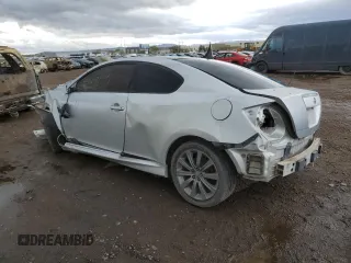 2006 Scion tC z VIN JTKDE167760067676, wystawiony jako Copart lot #59918215 z przebiegiem Nie podano mil oraz Szkoda całkowita • Salvage title. Historia ofert i sprzedaży dostępna na DreamBid. Obrazek 2.