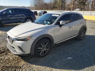 2016 Mazda CX-3 Grand Touring with VIN JM1DKBD70G0106540, listed as a Copart auction lot 45001355 with 233,341 mi miles and Salvage Title. Bid and sale history available at carsss.com. Image 1.