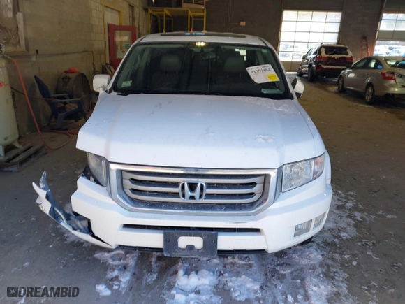 2014 Honda Ridgeline RTL with VIN 5FPYK1F55EB012490, listed as a IAAI auction lot 41391884 with 130,121 mi miles. Bid and sale history available at carsss.com. Image 12.