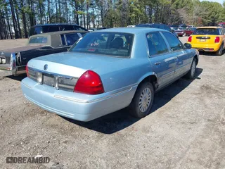 2008 Mercury Grand Marquis LS with VIN 2MEHM75V88X618599, listed as a IAAI auction lot 41698391 with 238,557 mi miles. Bid and sale history available at carsss.com. Image 4.