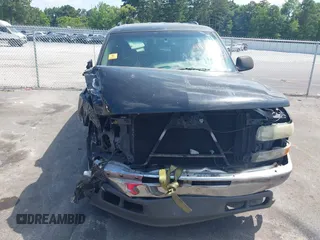 2003 Chevrolet Tahoe LS with VIN 1GNEC13V13J277725, listed as a IAAI auction lot 42610589 with Not provided miles and . Bid and sale history available at DreamBid. Image 6.