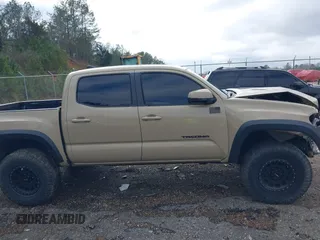 2017 Toyota Tacoma SR5 with VIN 5TFCZ5AN8HX076997, listed as a IAAI auction lot 41639530 with 93,328 mi miles and . Bid and sale history available at DreamBid. Image 14.