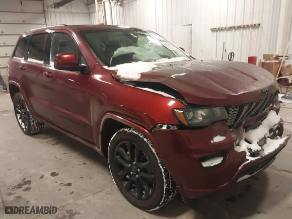 2018 Jeep Grand Cherokee Laredo E with VIN 1C4RJFAG9JC436803, listed as a IAAI auction lot 41572437 with 106,941 mi miles. Bid and sale history available at carsss.com. Image 1.