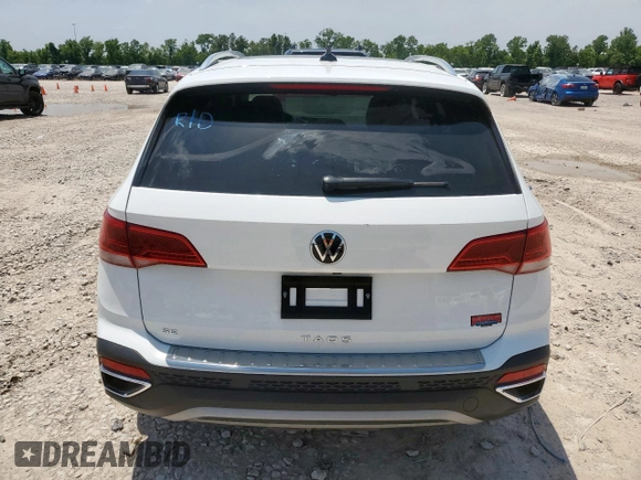 2024 Volkswagen Taos SE z VIN 3VVEX7B20RM002688, wystawiony jako Copart lot #57258985 z przebiegiem 9875 mil mil oraz Czysty tytuł • Clean title. Historia ofert i sprzedaży dostępna na DreamBid. Obrazek 6.