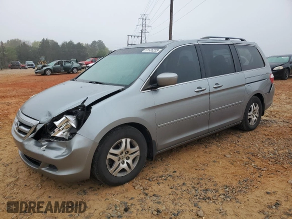 2006 Honda Odyssey EX-L with VIN 5FNRL38786B098075, listed as a Copart auction lot 51526235 with 164,192 mi miles and Salvage Title. Bid and sale history available at carsss.com. Image 1.
