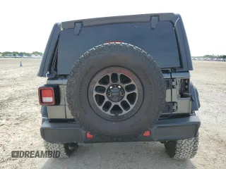 2023 Jeep Wrangler Willys with VIN 1C4HJXDGXPW526093, listed as a Copart auction lot 56818935 with 24,021 mi miles and Salvage title. Bid and sale history available at DreamBid. Image 6.