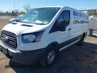 2017 Ford Transit with VIN 1FTYE1YM2HKB34459, listed as a IAAI auction lot 42059820 with 215,646 mi miles and . Bid and sale history available at DreamBid. Image 2.