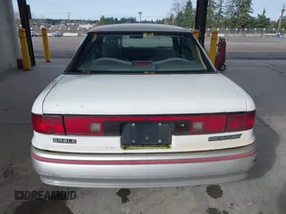 1992 Mercury Sable z VIN 1MECM5049NG647978, wystawiony jako IAAI lot #41805346 z przebiegiem 23 634 mil mil oraz . Historia ofert i sprzedaży dostępna na DreamBid. Obrazek 16.