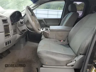 2006 Nissan Titan SE z VIN 1N6BA06AX6N546044, wystawiony jako Copart lot #57662705 z przebiegiem 207 161 mil mil oraz Czysty tytuł • Clean title. Historia ofert i sprzedaży dostępna na DreamBid. Obrazek 7.