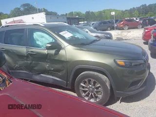 2019 Jeep Cherokee Latitude Plus with VIN 1C4PJMLB4KD418282, listed as a IAAI auction lot 42020995 with 58,000 mi miles and . Bid and sale history available at DreamBid. Image 13.