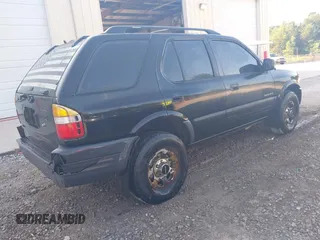 1998 Isuzu Rodeo with VIN 4S2CK58DXW4316412, listed as a IAAI auction lot 42785298 with 262,478 mi miles and . Bid and sale history available at DreamBid. Image 4.