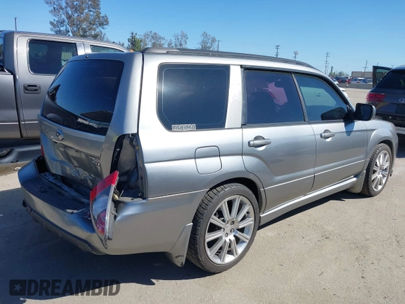 2007 Subaru Forester Sports XT with VIN JF1SG69687H733459, listed as a IAAI auction lot 41827464 with 139,943 mi miles. Bid and sale history available at carsss.com. Image 4.