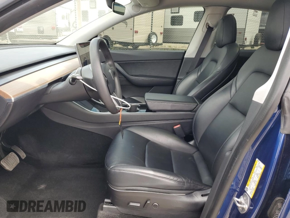 2021 Tesla Model Y Long Range with VIN 5YJYGDEE3MF094165, listed as a Copart auction lot 52907835 with 141,260 mi miles and Salvage Title. Bid and sale history available at DreamBid. Image 7.