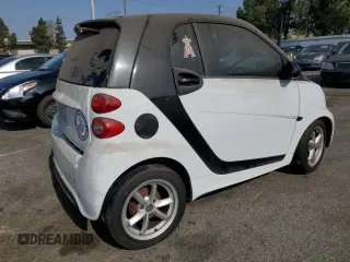 2014 Smart fortwo Pure with VIN WMEEJ3BA3EK780633, listed as a Copart auction lot 54009185 with 104,688 mi miles and Clean Title. Bid and sale history available at DreamBid. Image 3.