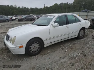 2000 Mercedes-Benz E-Class with VIN WDBJF70J1YB078418, listed as a Copart auction lot 71177244 with 189,838 mi miles and Salvage Title. Bid and sale history available at carsss.com. Image 1.