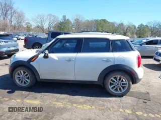 2014 MINI Countryman with VIN WMWZB3C52EWR42241, listed as a IAAI auction lot 41734963 with 121,325 mi miles and . Bid and sale history available at DreamBid. Image 14.