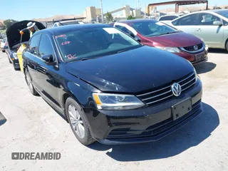 2015 Volkswagen Jetta SE z VIN 3VWD17AJ9FM298291, wystawiony jako IAAI lot #42543981 z przebiegiem 138 425 mil mil oraz . Historia ofert i sprzedaży dostępna na DreamBid. Obrazek 1.