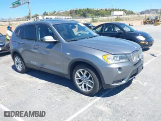 2013 BMW X3 xDrive28i with VIN 5UXWX9C58D0A31571, listed as a IAAI auction lot 41872088 with 126,945 mi miles. Bid and sale history available at carsss.com. Image 1.