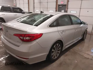 2015 Hyundai Sonata Sport with VIN 5NPE34AF3FH141616, listed as a IAAI auction lot 41005650 with 138,291 mi miles and . Bid and sale history available at DreamBid. Image 4.