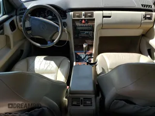 1997 Mercedes-Benz E-Class with VIN WDBJF55F4VJ032270, listed as a Copart auction lot 48010725 with 191,091 mi miles and Salvage Title. Bid and sale history available at carsss.com. Image 8.