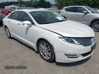 2014 Lincoln MKZ Hybrid z VIN 3LN6L2LU2ER825732, wystawiony jako IAAI lot #42606357 z przebiegiem 153 966 mil mil oraz . Historia ofert i sprzedaży dostępna na DreamBid. Obrazek 1.